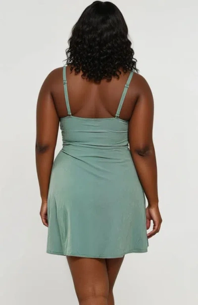 Calypsa Plus Size Alana Wrap-style Swim Dress With Hidden Bottoms And Adjustable Straps In Green