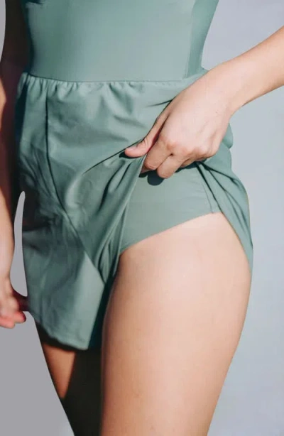 Calysa Plus Size Ivy Short Swim Romper With Built-in Bra And Hidden Shorts In Green