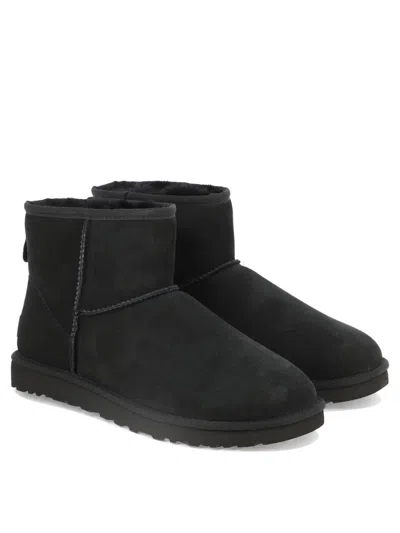 Ugg 'classic Mini' Black Ankle Boots With Logo Patch On The Rear And Shearling Lining In Suede Man In Black