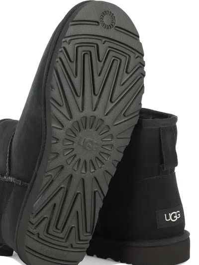Ugg 'classic Mini' Black Ankle Boots With Logo Patch On The Rear And Shearling Lining In Suede Man In Black