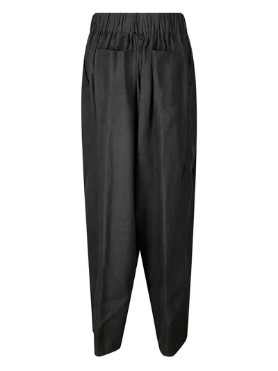 Cini Studio Trousers In Black