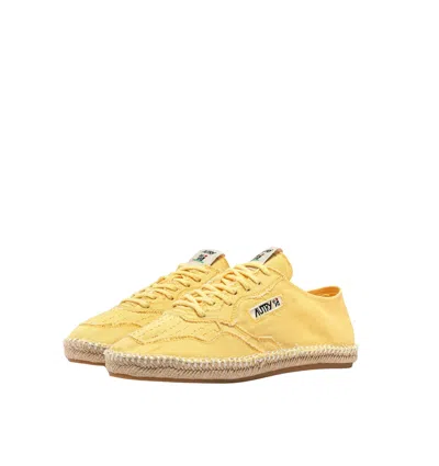 Autry Low Canvas Sneakers Espadrille Sole In Gold