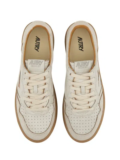 Autry Low Top Leather Sneakers With Perforated Round Toe In White