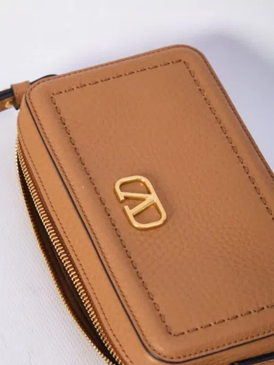 Valentino Garavani Mini Leather Crossbody Bag With Adjustable Strap In Brown
