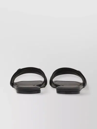 Ferragamo Leather Slides With Flat Sole And Gold-tone Hardware In Black