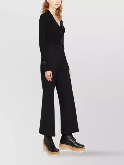Stella Mccartney Flared Trousers With Front Pleats And Pockets In Black