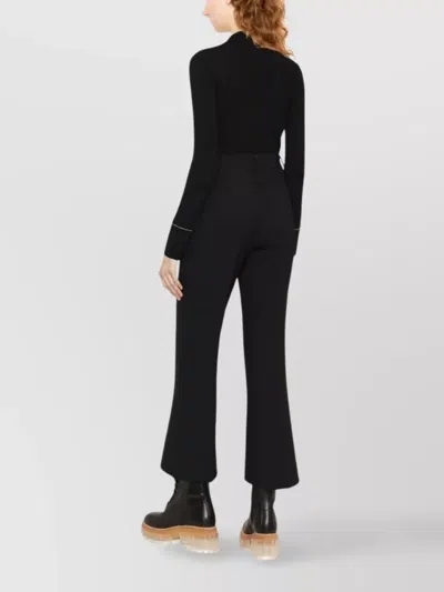 Stella Mccartney Flared Trousers With Front Pleats And Pockets In Black