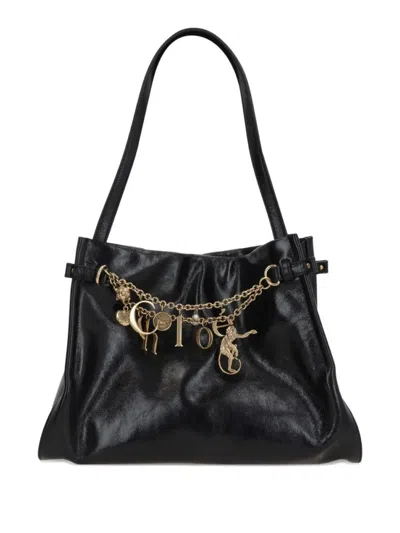 Chloé Logo Charms Patent Leather Hobo Bag In Black