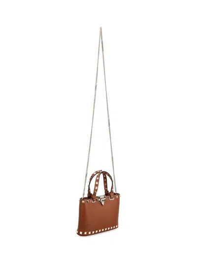 Valentino Mini Rockstud Embellished Tote Bag In Brown