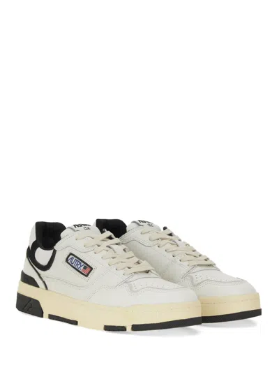 Autry White Low Top Sneakers With Black Details And Logo Patch In Leather And Suede Man