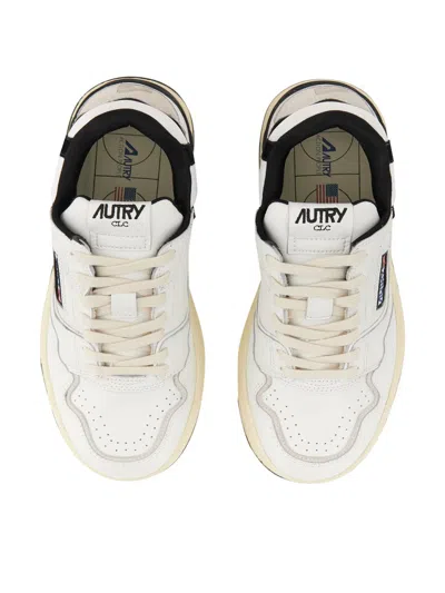 Autry White Low Top Sneakers With Black Details And Logo Patch In Leather And Suede Man