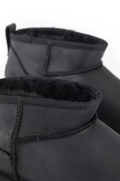 Ugg Classic Ultra Mini Black Ankle Boots With Shearling Lining In Leather Woman In Black