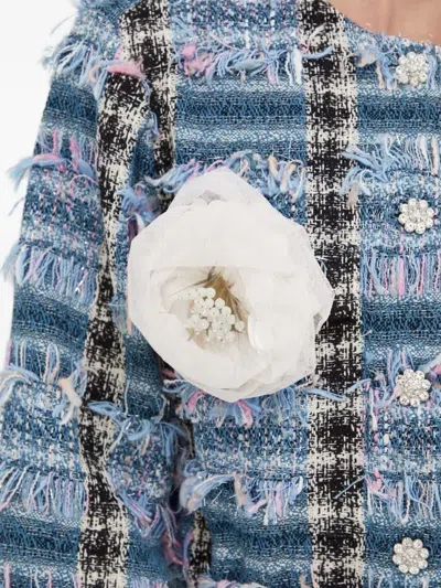 流苏边仿羔皮呢夹克