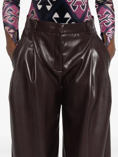 The Andamane Maxi Flare Vegan Leather Trousers In Purple