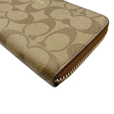 Pre-owned Coach Signature Brown Pvc Wallet (bi-fold) ()