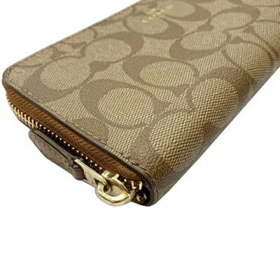 Pre-owned Coach Signature Brown Pvc Wallet (bi-fold) ()
