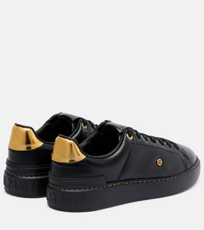 Balmain Sneakers 'court' Gold-tone Detail In Black
