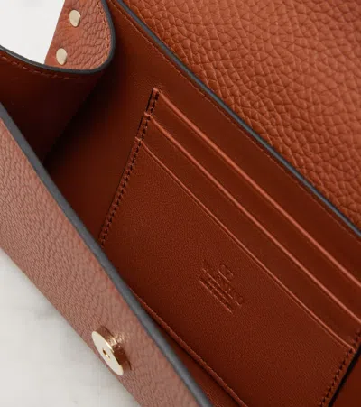 Valentino Rockstud Mini Grainy Leather Wallet On Chain In Brown