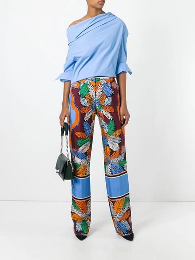 Shop Emilio Pucci Printed Wide Leg Pants - Multicolour