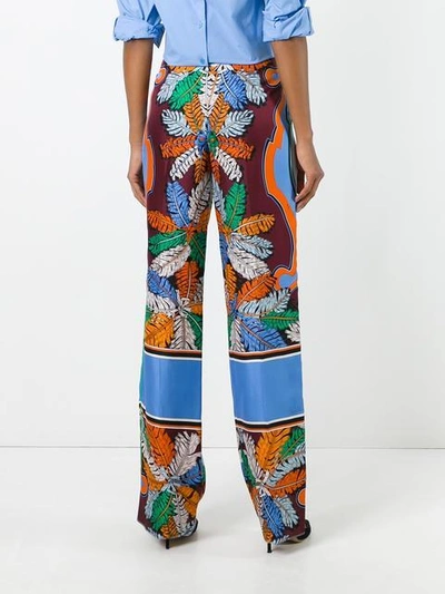 Shop Emilio Pucci Printed Wide Leg Pants - Multicolour