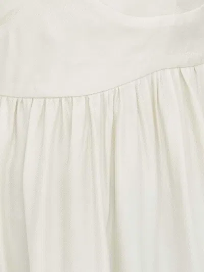 Lovechild Tie-strap Smocked Blouse In Multi