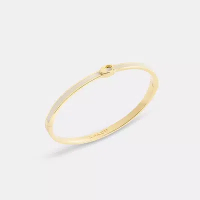Coach Thin Enamel Signature Hinged Bangle In Gold