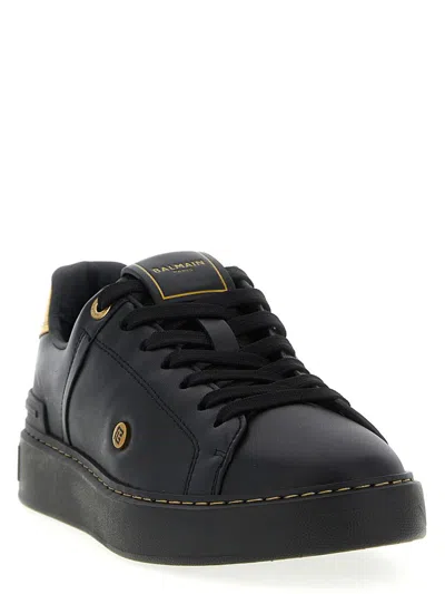 Balmain Sneakers 'court' Gold-tone Detail In Black