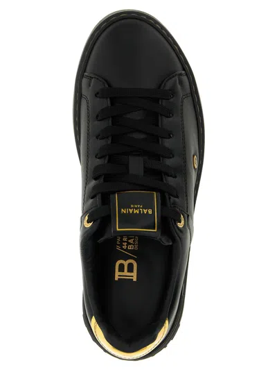 Balmain Sneakers 'court' Gold-tone Detail In Black
