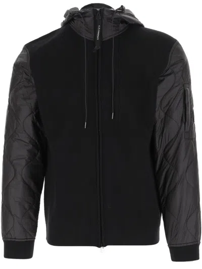 C.p. Company Men Black Jacket With Drawstring Hood And Logo Plaque On The Sleeve In Wool Man In Black