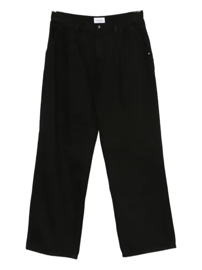 褶饰口袋牛仔裤