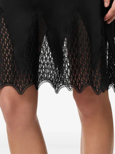 蕾丝边饰中长半身裙