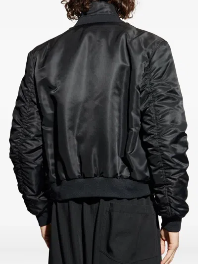 Alexander Mcqueen Mcqueen Technical Crop Bomber Jacket In Black