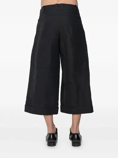 Devoa Pleated Cuffed Trousers In Black