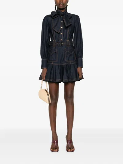 Zimmermann Tie-detailed Belted Ruffled Denim Mini Dress In Blue