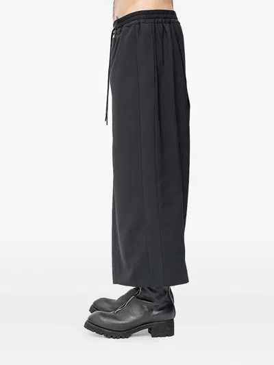 Devoa Wrap-front Drawstring Trousers In Black