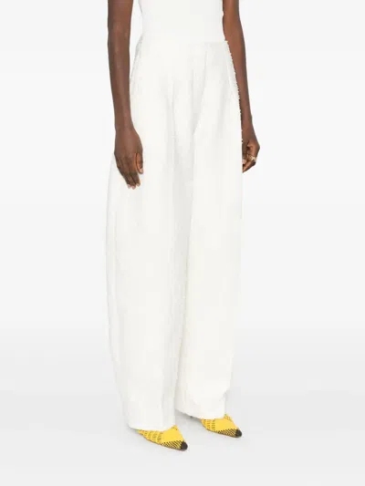 Jacquemus Le Curvo Tweed Trousers In White