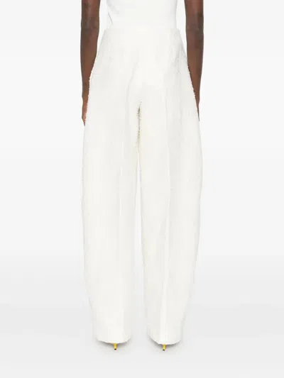 Jacquemus Le Curvo Tweed Trousers In White