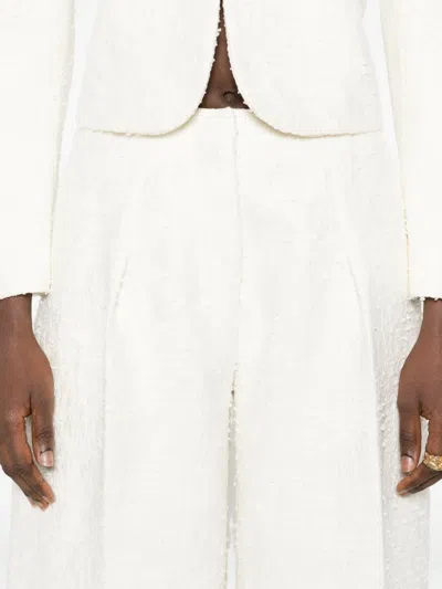 Jacquemus Le Curvo Tweed Trousers In White