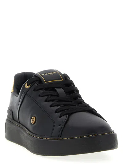 Balmain Sneakers 'court' Gold-tone Detail In Black
