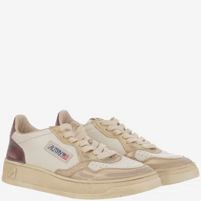 Autry Super Vintage Distressed Paneled Metallic Leather Sneakers In White