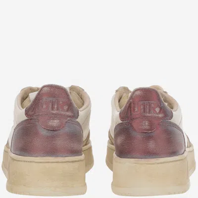 Autry Super Vintage Distressed Paneled Metallic Leather Sneakers In White