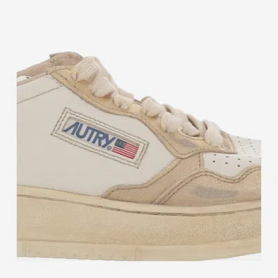 Autry Super Vintage Distressed Paneled Metallic Leather Sneakers In White