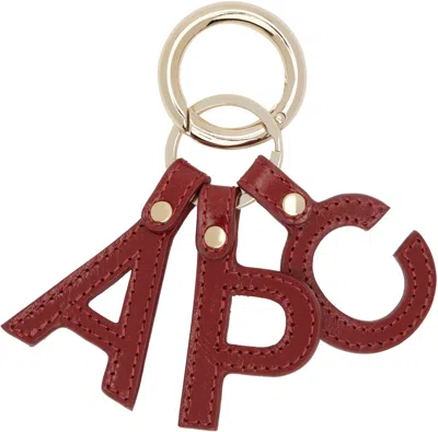 Apc Gold & Red Lettres 'a.p.c.' Keychain In Burgundy