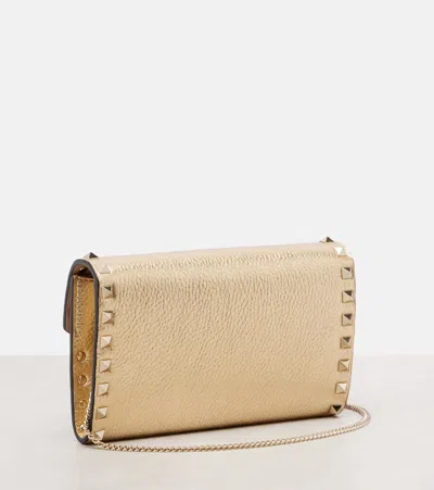 Valentino Garavani Rockstud Small Leather Shoulder Bag In Gold
