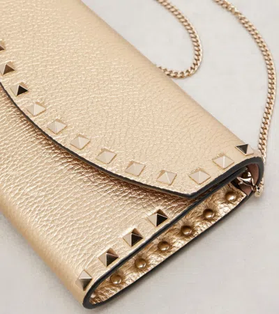 Valentino Garavani Rockstud Small Leather Shoulder Bag In Gold