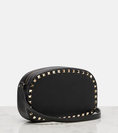 Valentino Garavani Textured Leather Shoulder Bag With Adjustable Strap In Black
