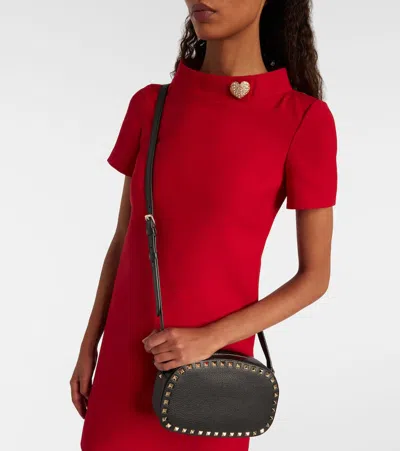 Valentino Garavani Textured Leather Shoulder Bag With Adjustable Strap In Black