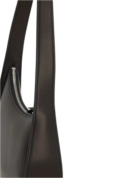 The Row Crescent Zip Shoulder Bag In Black