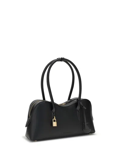 Stella Mccartney Stella Ryder Logo-embossed Embellished Textured Vegan Leather Tote In Black
