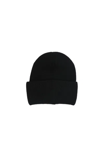 Moncler Ribbed Knit Carded Wool Beanie With Felt Logo Patch In Black